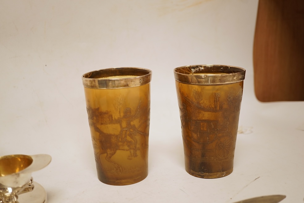 A novelty horse-related cruet stand, a pair of silver mounted horn beakers and three other items